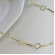 Colar com Corrente Detalhada com Flor Vazada Banhado em Ouro 18k