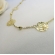 Colar Longo com Bolinha e Flor Banhado em Ouro 18k