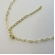 Choker com Coração Vazado Pequeno Interligado Banhado em Ouro 18k